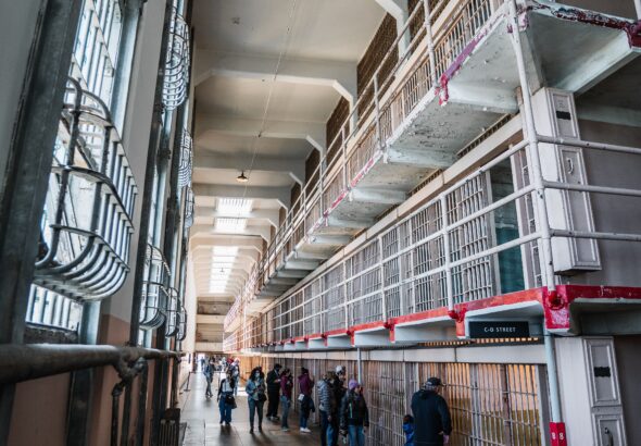 Visitors explore the historic cell blocks of Alcatraz prison, San Francisco.