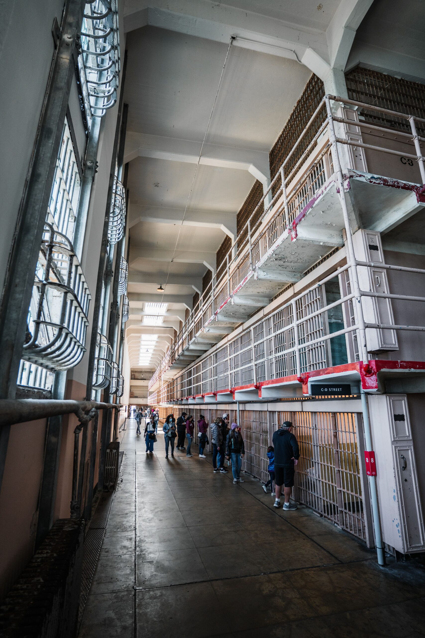 Visitors explore the historic cell blocks of Alcatraz prison, San Francisco.